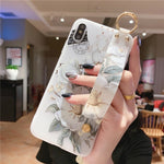 Load image into Gallery viewer, Fashionable Emboss Flower Wristband Phone Case (for iPhone 12, 12 mini, 12 Pro, 12 Pro Max, SE 2020, 11, 11 Pro, 11 Pro Max, X, XS, XR, XS Max)

